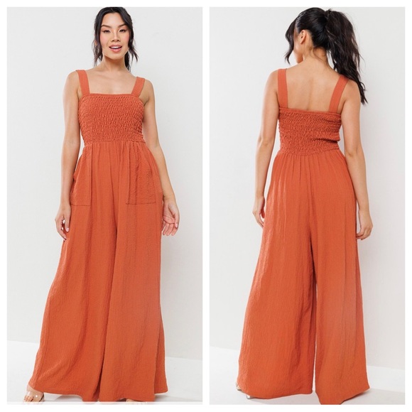 ShopEvelynne Pants - Fabulous Smocked Straight Neck Wide Leg Jumpsuit